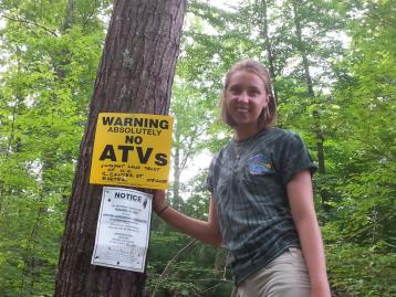 Jo Lewis and property signs