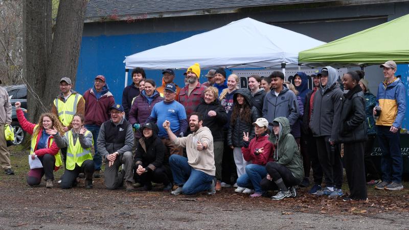 large group of smiling volunteers