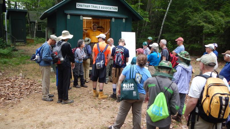 Group of volunteers listening to instructions