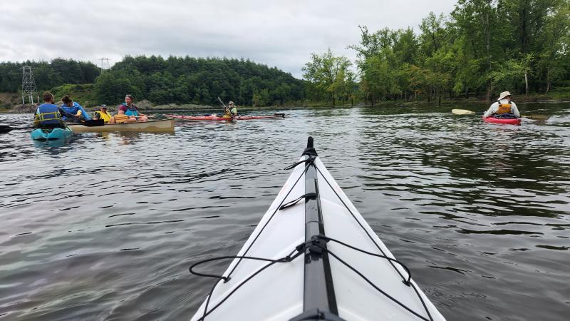 person in kayak on the water