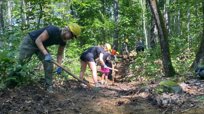 volunteers going trail work