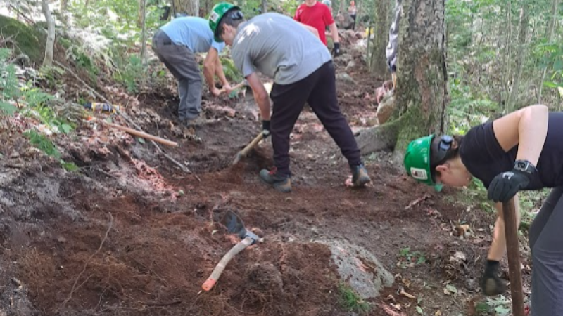 people doing trail work
