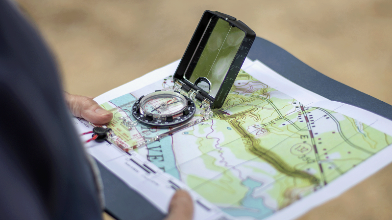 person using compass