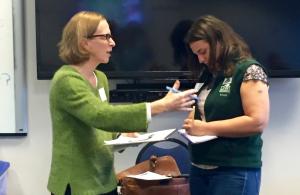 Pros meeting to talk stewardship two women