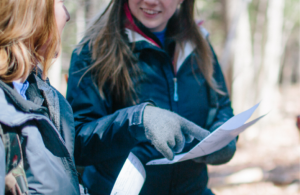 Person looking at easement form in the field