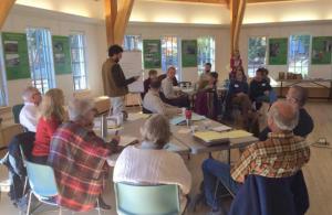 Harris Center internal view of meeting with people at tables