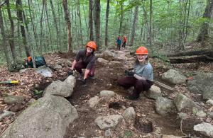two volunteers on trail 