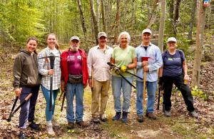 Volunteers with loppers