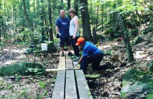 Trail volunteers on boardwalk