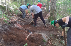 people doing trail work