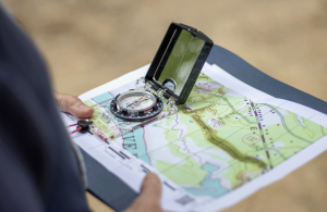 person using compass