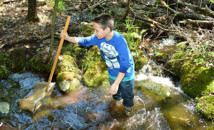 Student in water at Bioblitz