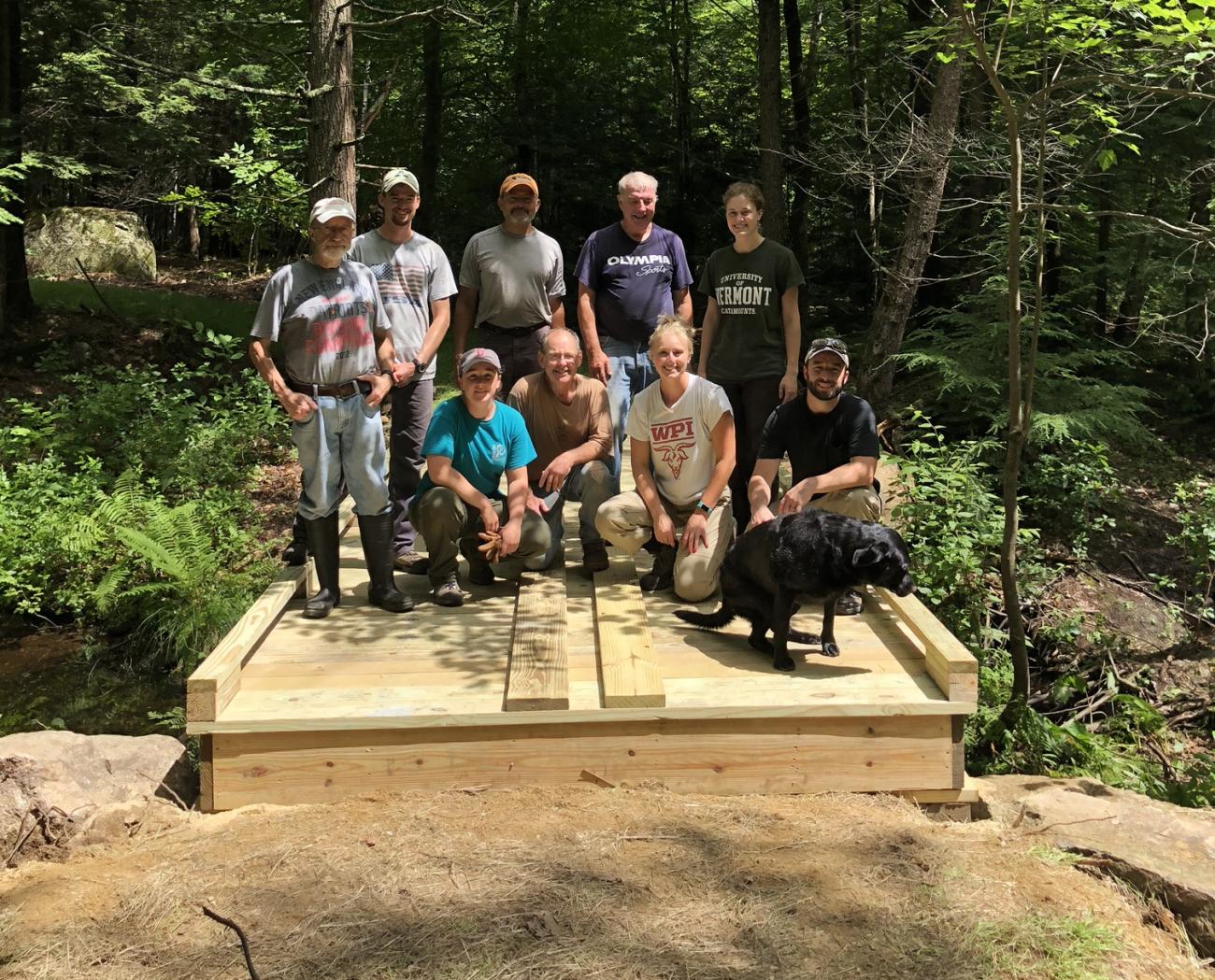 new bridge with volunteers from NEMO