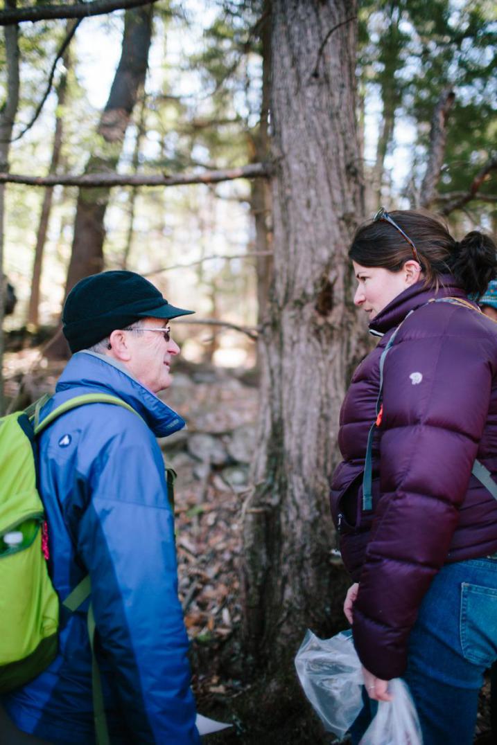 volunteer talking to nature groupie staff