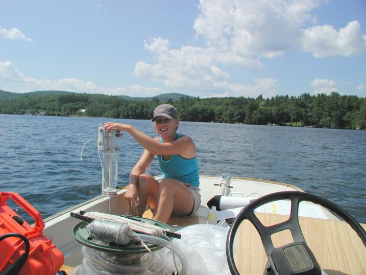 Student collecting water quality samples