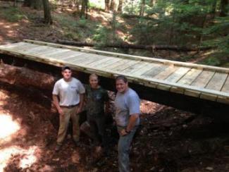 Jo Lewis and new bridge in College Woods