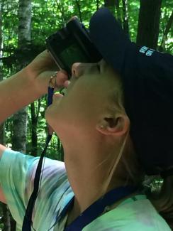 Jo Lewis holding hypsometer in College Woods