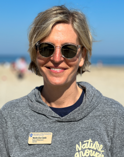 Malin Clyde headshot at the beach