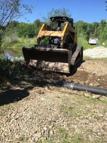 Skidsteer and beaver pipe project