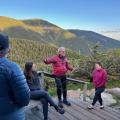 volunteer speaking to group of hikers