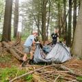 two people removing trash