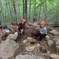 two volunteers on trail 