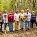 Volunteers with loppers