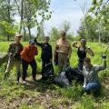 group with bags full of pulled garlic mustard