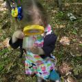 child using magnifying glass
