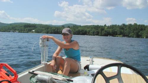 Student collecting water quality samples